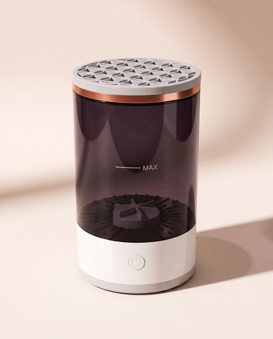Sanfira electric makeup brush cleaner, three-quarter view on a porcelain surface