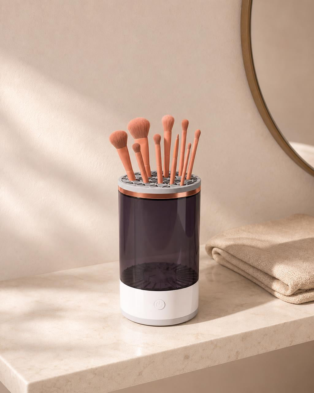 The cleaner on a marble shelf holding ten brushes upright to dry